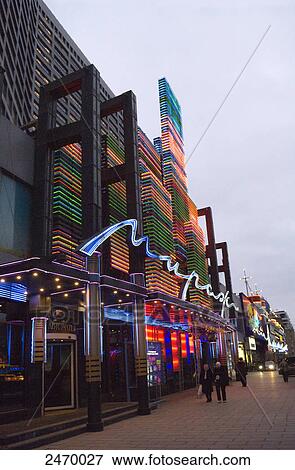 Tourists in front of lit up building, Novy Arbat, Moscow, Russia View Large Photo Image Stock Photo - Tourists in front of lit up building, Novy Arbat, Moscow, Russia . Fotosearch