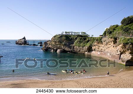 Stock Image - Tourists kayaking in ocean, Port Vieux, Biarritz, Pyrenees-Atlantiques, Aquitaine, France . Fotosearch