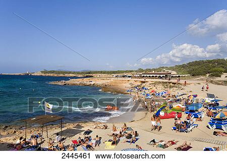 Tourists on beach, Cala Comte, Ibiza, Balearic Islands, Spain View Large Photo Image Stock Image - Tourists on beach, Cala Comte, Ibiza, Balearic Islands, Spain . Fotosearch