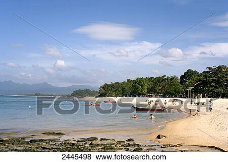 Tourists on beach, Pantai Tengah, Langkawi Island, Malaysia View Large Photo Image Stock Photo - Tourists on beach, Pantai Tengah, Langkawi Island, Malaysia . Fotosearch