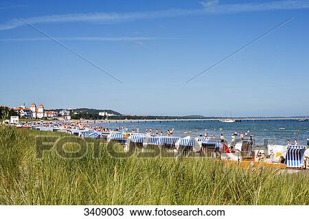 Tourists on the beach of Binz, Ruegen, Germany View Large Photo Image Stock Image - Tourists on the beach of Binz, Ruegen, Germany . Fotosearch