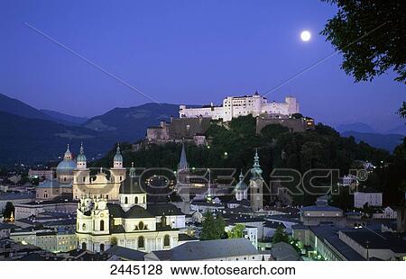 Town with castle in background, Burg Hohenwerfen Castle, Salzburg, Austria View Large Photo Image Stock Photo - Town with castle in background, Burg Hohenwerfen Castle, Salzburg, Austria . Fotosearch