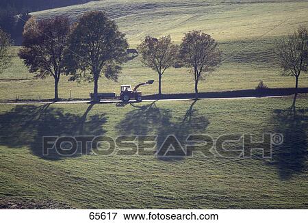 Stock Photo - Tractor in field, Germany . Fotosearch