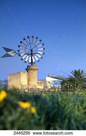 Traditional windmill in field, Majorca, Balearic Islands, Spain View Large Photo Image Stock Photography - Traditional windmill in field, Majorca, Balearic Islands, Spain . Fotosearch