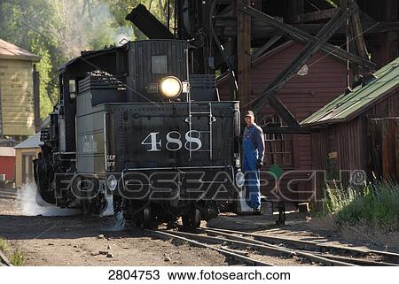 Train at railroad station, Colorado, USA View Large Photo Image Stock Image - Train at railroad station, Colorado, USA . Fotosearch