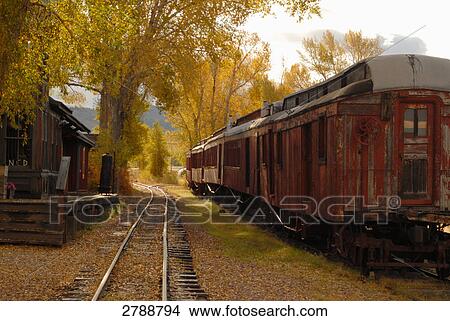Picture - Train on railroad track in ghost town, Virginia City, Montana, USA . Fotosearch