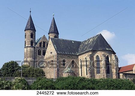Trees in front of church, Magdeburg, Saxony-Anhalt, Germany View Large Photo Image Stock Image - Trees in front of church, Magdeburg, Saxony-Anhalt, Germany . Fotosearch