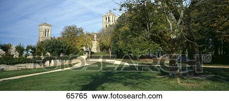 Trees near church, Basilique Sainte-Marie-Madeleine, Vezelay, Yonne, Burgundy, France View Large Photo Image Stock Photography - Trees near church, Basilique Sainte-Marie-Madeleine, Vezelay, Yonne, Burgundy, France . Fotosearch