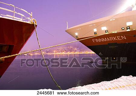 Stock Image - Two ships moored at shore, Norway . Fotosearch