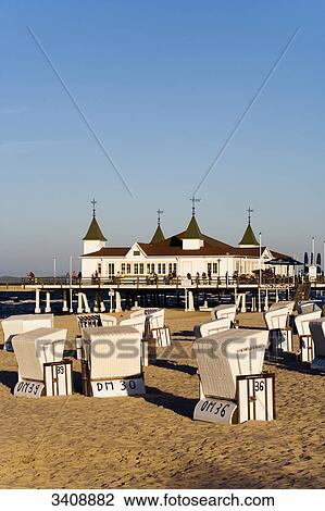 View of Ahlbeck pier, Hooded Beach Chairs in the foreground, Usedom, Germany View Large Photo Image Stock Image - View of Ahlbeck pier, Hooded Beach Chairs in the foreground, Usedom, Germany . Fotosearch