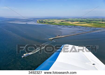 View of ferry dock of Pellworm, Schleswig-Holstein, Germany, aerial view View Large Photo Image Stock Photo - View of ferry dock of Pellworm, Schleswig-Holstein, Germany, aerial view . Fotosearch
