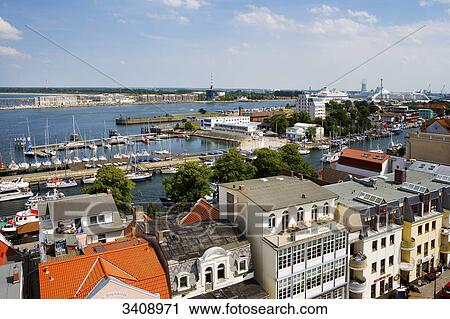 View of the harbour of Warnemuende, Rostock, Germany, bird's eye view View Large Photo Image Stock Image - View of the harbour of Warnemuende, Rostock, Germany, bird's eye view . Fotosearch