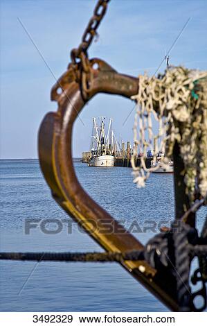 View of the old harbour of Tammensiel, ship in the foreground, Pellworm, Schleswig-Holstein, Germany View Large Photo Image Stock Photo - View of the old harbour of Tammensiel, ship in the foreground, Pellworm, Schleswig-Holstein, Germany . Fotosearch