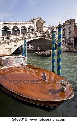 View of the Rialto Bridge, boat in the foreground, Venice, Italy View Large Photo Image Stock Photography - View of the Rialto Bridge, boat in the foreground, Venice, Italy . Fotosearch