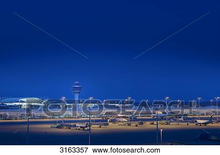 View to tower and airfield of Munich Airport, Bavaria, Germany View Large Photo Image Stock Photo - View to tower and airfield of Munich Airport, Bavaria, Germany . Fotosearch