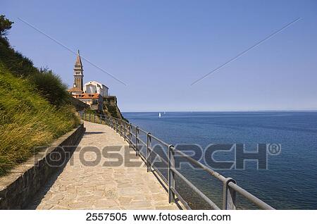 Walkway at seaside, Piran, Balkan Peninsula, Slovenia View Large Photo Image Stock Photography - Walkway at seaside, Piran, Balkan Peninsula, Slovenia . Fotosearch