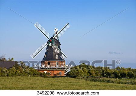 Windmill in Borgsum, Foehr, Schleswig-Holstein, Germany View Large Photo Image Stock Photo - Windmill in Borgsum, Foehr, Schleswig-Holstein, Germany . Fotosearch