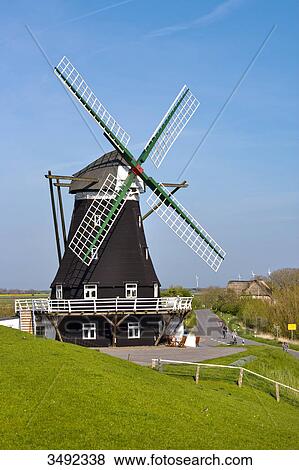 Windmill in Pellworm, North Frisian Islands, Germany, elevated view View Large Photo Image Stock Photo - Windmill in Pellworm, North Frisian Islands, Germany, elevated view . Fotosearch