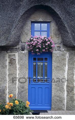 Window box above blue door of house, Pont-Aven, Finistere, Brittany, France View Large Photo Image Stock Photo - Window box above blue door of house, Pont-Aven, Finistere, Brittany, France . Fotosearch