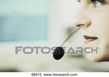Woman with headset, close-up View Large Photo Image Stock Photography - Woman with headset, close-up . Fotosearch