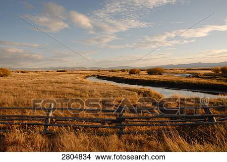 Picture - Wooden fence in field, Big Hole Valley, Montana, USA . Fotosearch