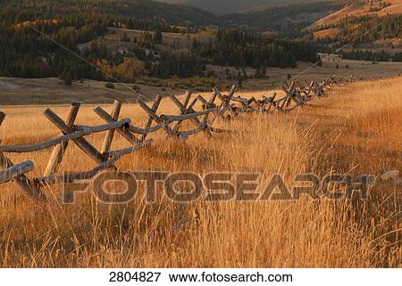 Stock Photo - Wooden fence in field, Montana, USA . Fotosearch