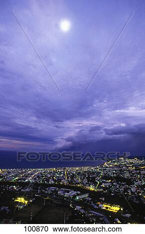Aerial view of city lit up at night, St-Denis, Reunion Island, France View Large Photo Image Stock Image - Aerial view of city lit up at night, St-Denis, Reunion Island, France . Fotosearch