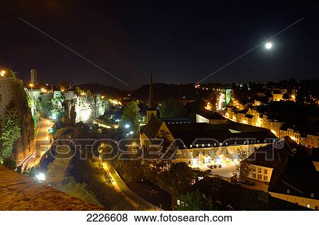 Aerial view of city lit up at night, River Alzette, Luxembourg City, Luxembourg View Large Photo Image Stock Photo - Aerial view of city lit up at night, River Alzette, Luxembourg City, Luxembourg . Fotosearch