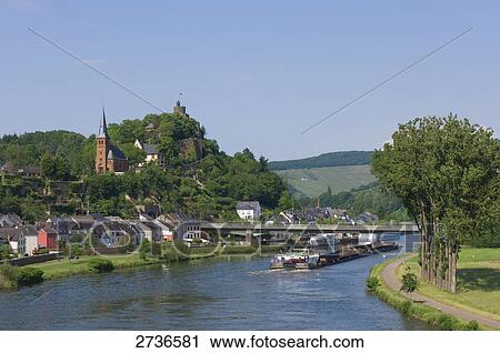 Stock Image - Barge in river, Saarburg, Rhineland-Palatinate, Germany . Fotosearch