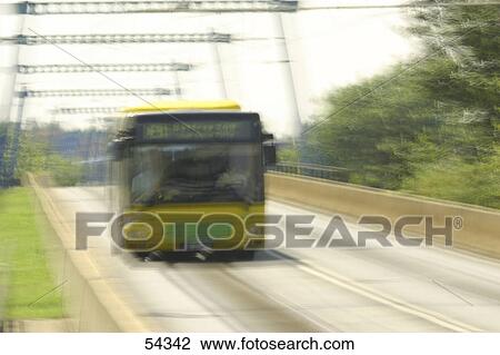 Blurred view of bus in motion on road View Large Photo Image Stock Image - Blurred view of bus in motion on road . Fotosearch