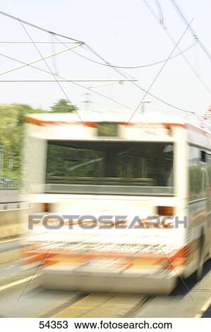 Blurred view of bus leaving bus stop View Large Photo Image Stock Image - Blurred view of bus leaving bus stop . Fotosearch