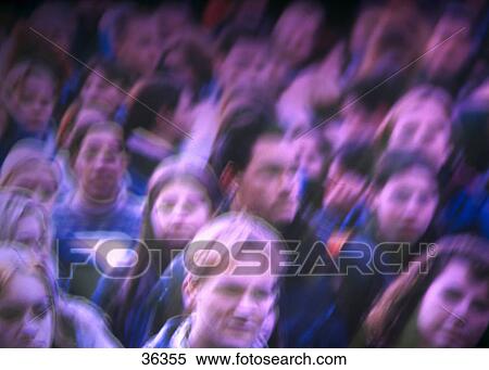 Stock Photography - Blurred view of crowd of people . Fotosearch