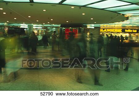 Blurred view of passengers in subway station, Cologne, Germany View Large Photo Image Stock Image - Blurred view of passengers in subway station, Cologne, Germany . Fotosearch