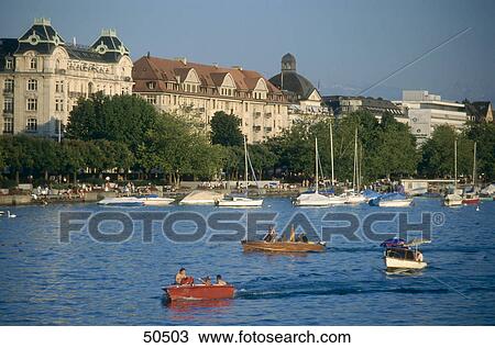 Boats in lake water, River Limmat, Zurich, Switzerland View Large Photo Image Stock Image - Boats in lake water, River Limmat, Zurich, Switzerland . Fotosearch