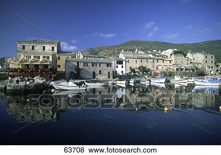 Boats moored at harbor, Cap Corse, France View Large Photo Image Stock Photo - Boats moored at harbor, Cap Corse, France . Fotosearch