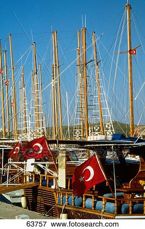 Boats moored at harbor, Fethiye, Mugla, Turkey View Large Photo Image Stock Photo - Boats moored at harbor, Fethiye, Mugla, Turkey . Fotosearch