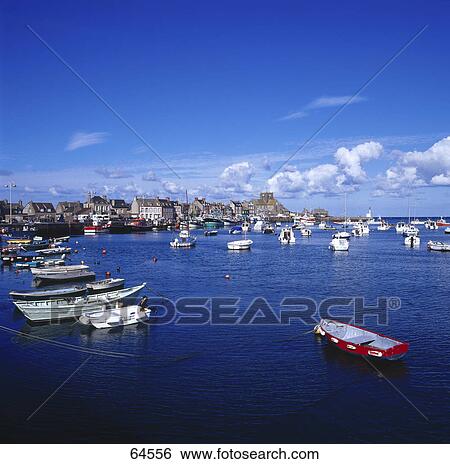 Stock Photograph - Boats moored at harbor, France . Fotosearch
