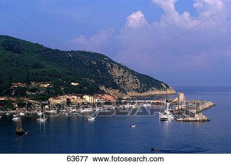 Boats moored at marina, Elba Island, Tuscany, Italy View Large Photo Image Stock Photo - Boats moored at marina, Elba Island, Tuscany, Italy . Fotosearch