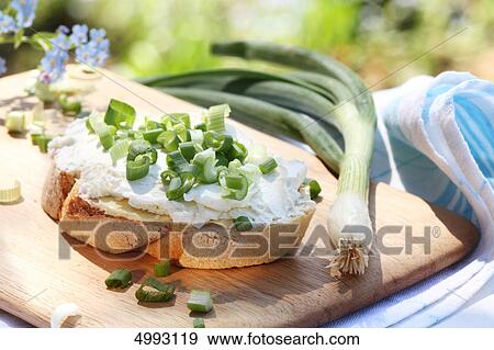Bread with cream cheese and chive and green onion View Large Photo Image Stock Photo - Bread with cream cheese and chive and green onion . Fotosearch