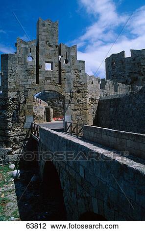 Bridge leading to old ruins of castle, Agios Pavlos, Greece View Large Photo Image Stock Image - Bridge leading to old ruins of castle, Agios Pavlos, Greece . Fotosearch