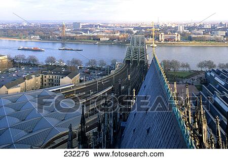 Stock Photograph - Bridge over river, Hohenzollernbrucke, Rhine River, Cologne, North Rhine-Westphalia, Germany . Fotosearch