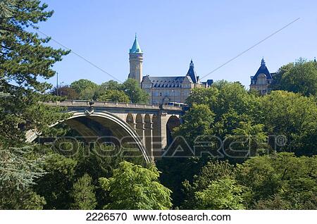 Stock Image - Bridge with bank building in background, Adolphe Bridge, Spuerkees, Luxembourg City, Luxembourg . Fotosearch