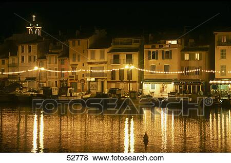 Stock Photo - Buildings at waterfront, Cassis, Provence-Alpes-Cote d'Azur, France . Fotosearch
