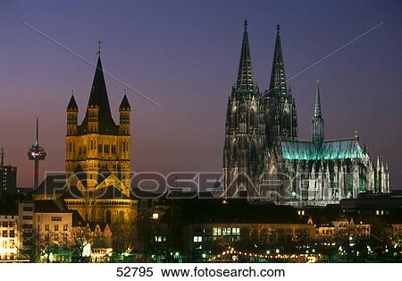 Buildings lit up at night in city, Cologne Cathedral, Cologne, North Rhine-Westphalia, Germany View Large Photo Image Stock Photography - Buildings lit up at night in city, Cologne Cathedral, Cologne, North Rhine-Westphalia, Germany . Fotosearch
