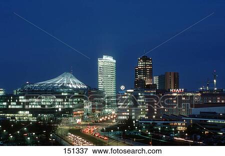 Stock Photo - Buildings lit up at night, Mercedes Building, Sony Center, Deutsche Bahn, Potsdamer Platz, Berlin, Germany . Fotosearch