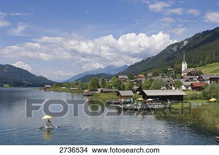 Buildings on waterfront, Weissensee, Techendorf, Carinthia, Austria View Large Photo Image Picture - Buildings on waterfront, Weissensee, Techendorf, Carinthia, Austria . Fotosearch
