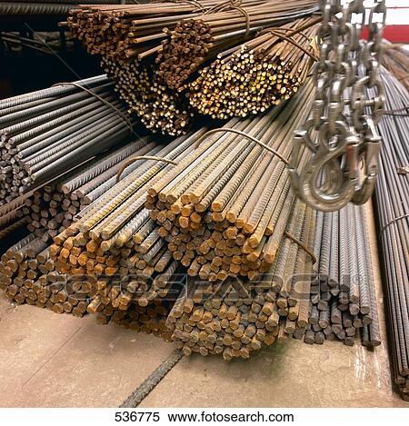 Bundle of metal rods with hanging chains View Large Photo Image Stock Photography - Bundle of metal rods with hanging chains . Fotosearch