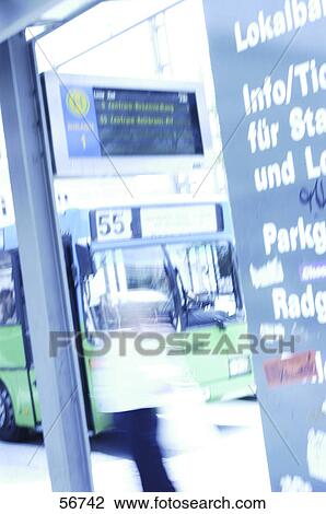 Stock Image - Bus arriving at bus stop . Fotosearch