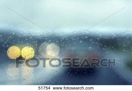 Picture - Car on road in rain . Fotosearch