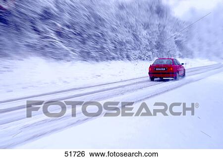 Stock Photograph - Car on snowy street . Fotosearch